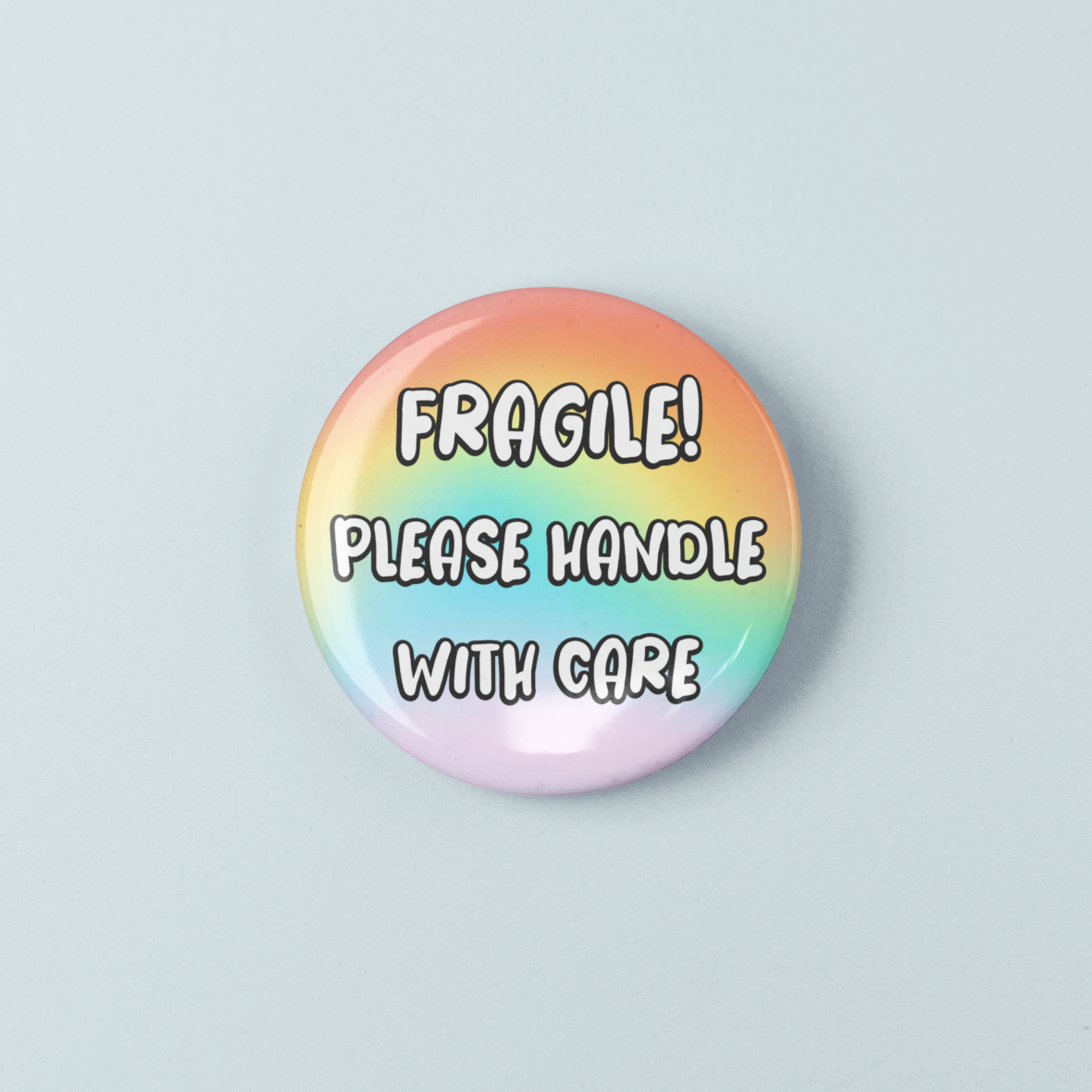 Round button with 'Fragile! Please handle with care' text on a gradient background