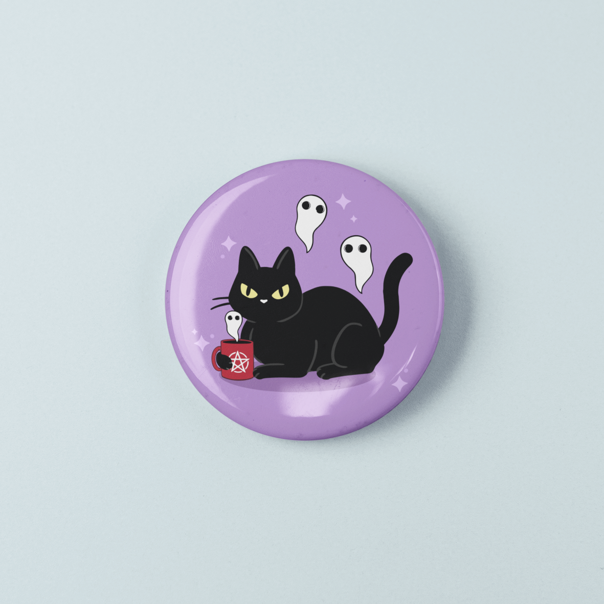 Button badge with a black cat and ghosts design on a light purple background