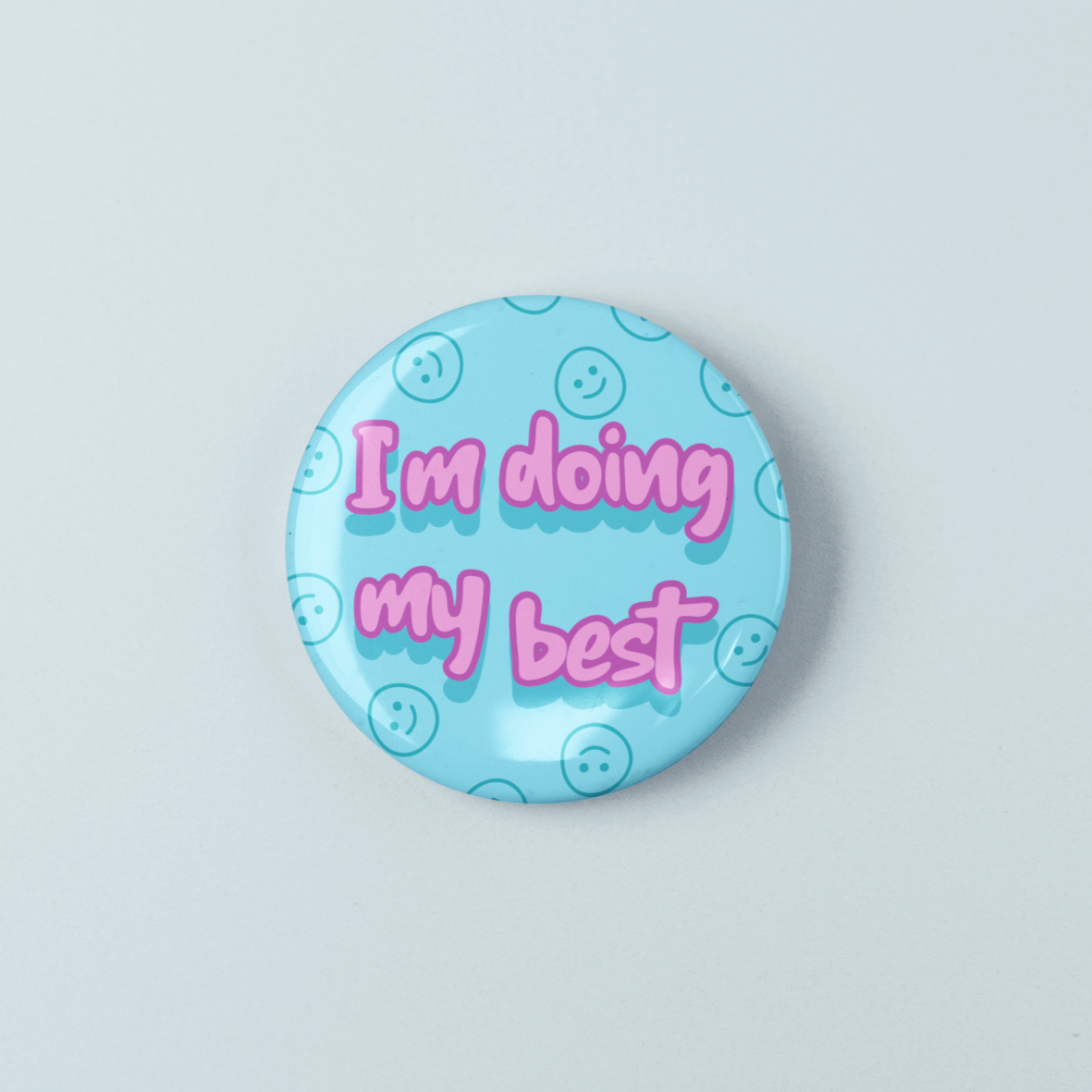 Button badge with 'I'm doing my best' text on a light blue background