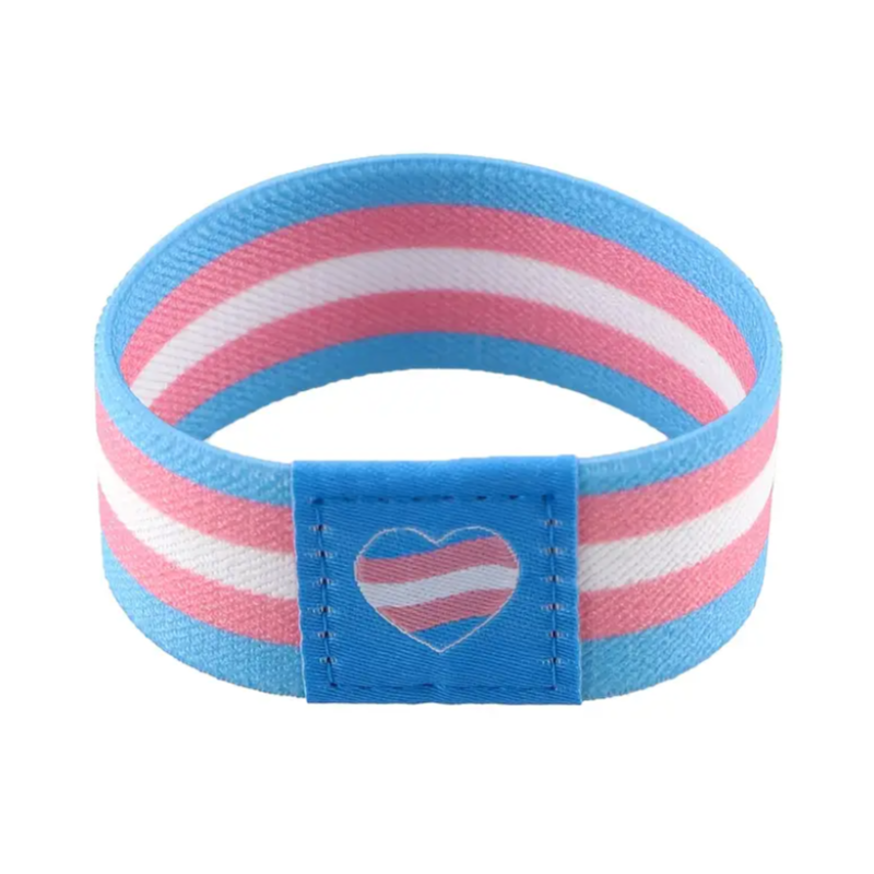 Striped wristband with a heart-shaped tag on a white background