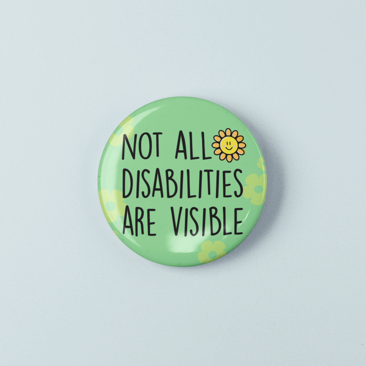 Button badge with 'Not all disabilities are visible' text on a light blue background