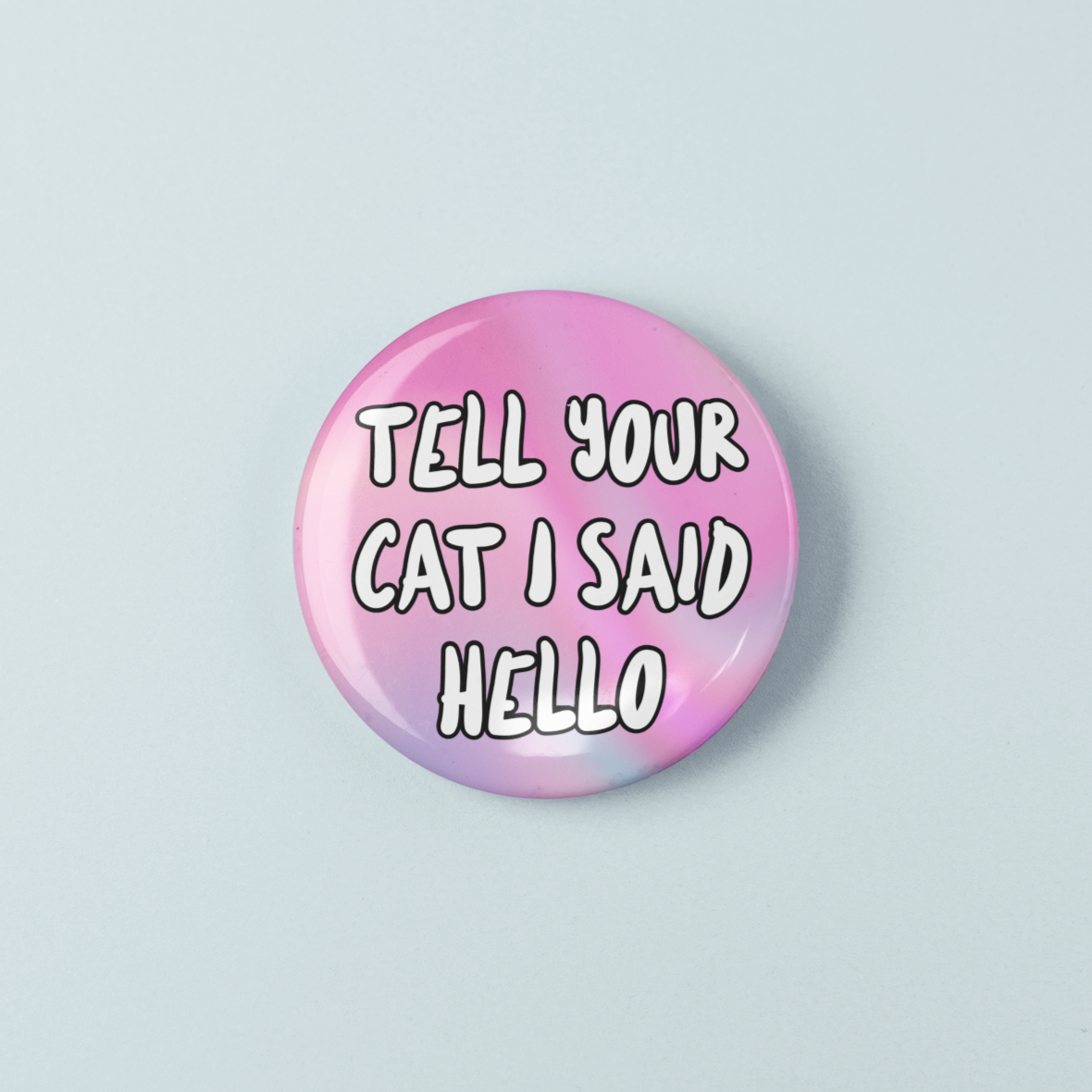 Pink button with text 'Tell your cat I said hello' on a light blue background
