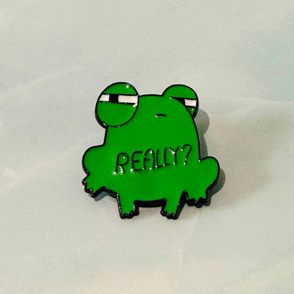 Green cartoon frog with 'REALLY?' text on a light gray background