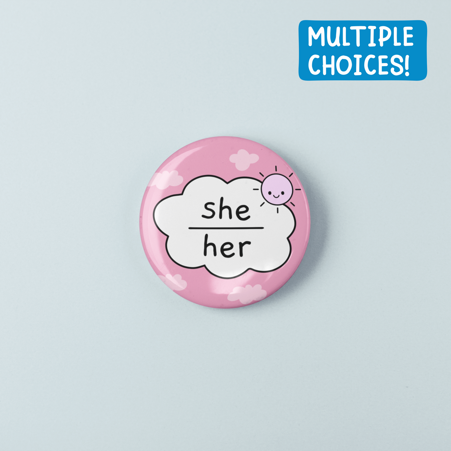 Pink button badge with 'she/her' pronoun on a light blue background