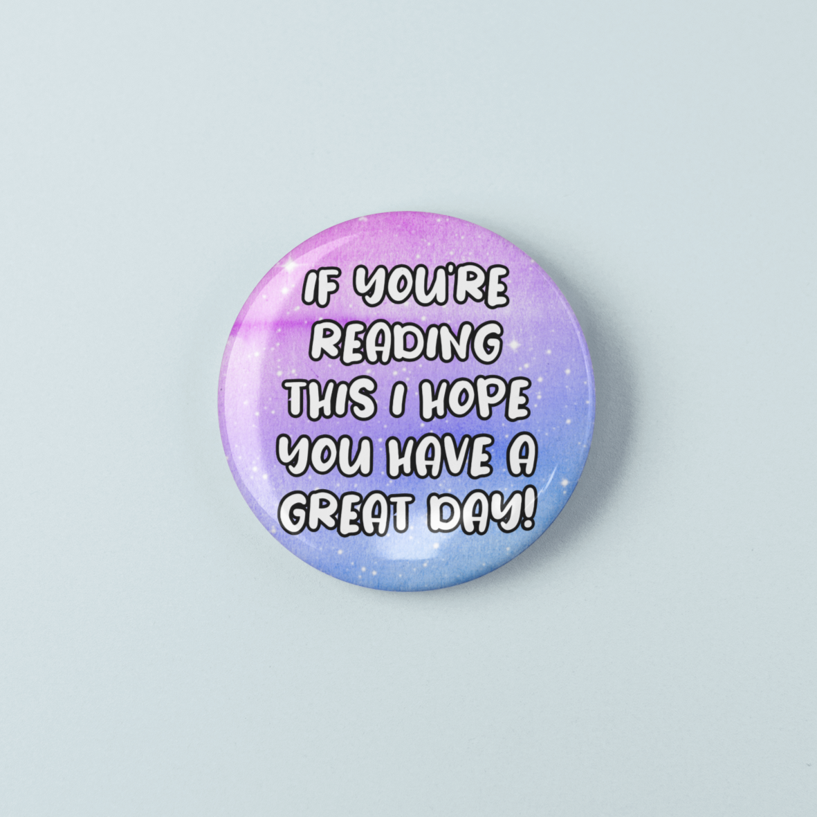 Button badge with text 'If you're reading this I hope you have a great day!' on a pastel gradient background