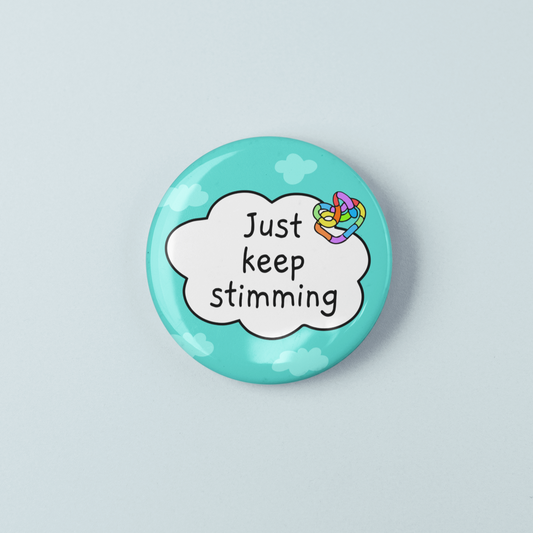 Button badge with 'Just keep stimming' text on a light blue background