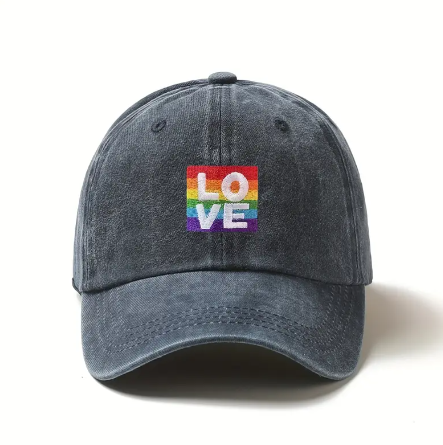Blue denim cap with a rainbow 'LOVE' logo on a white background