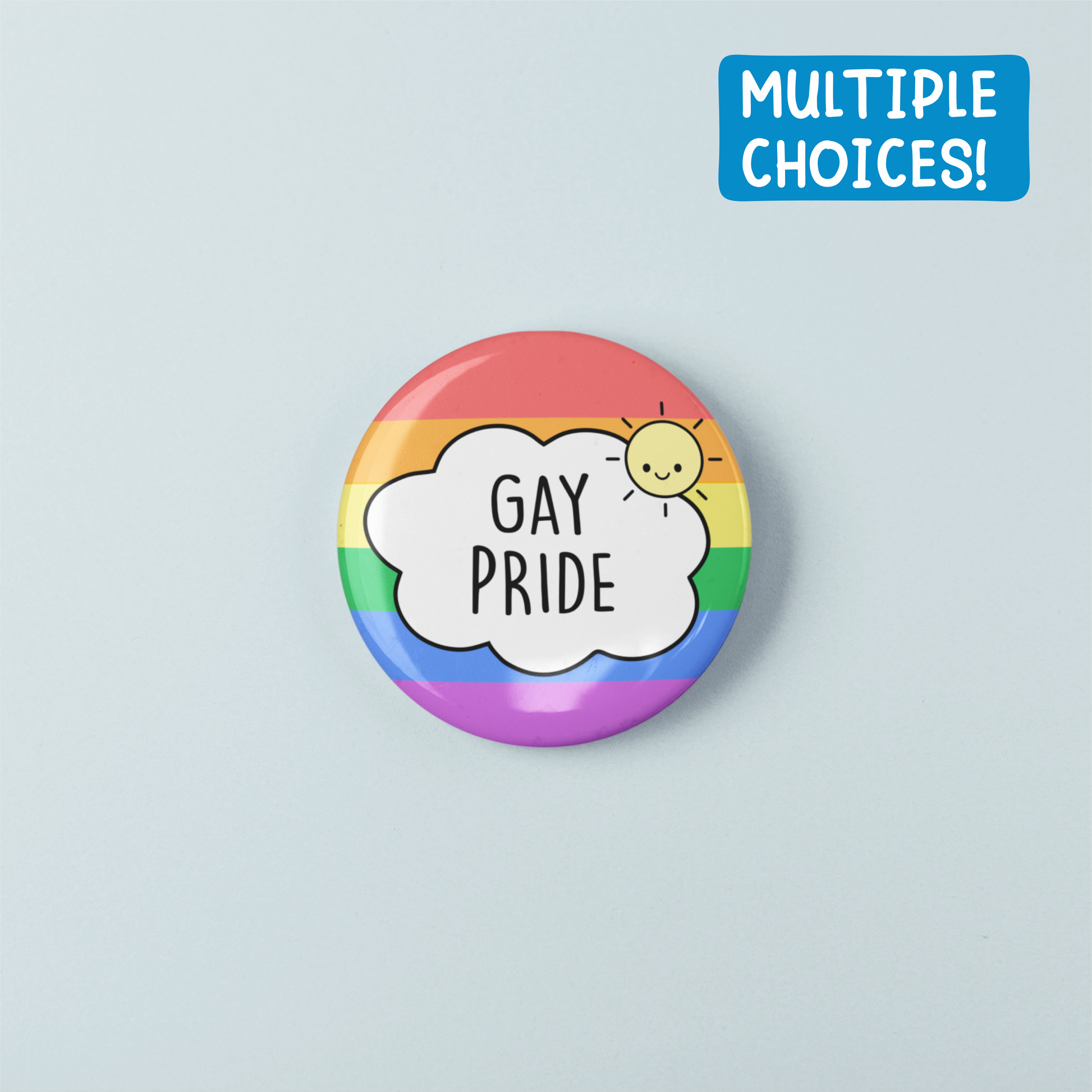 Rainbow button badge with 'Gay Pride' text on a light blue background